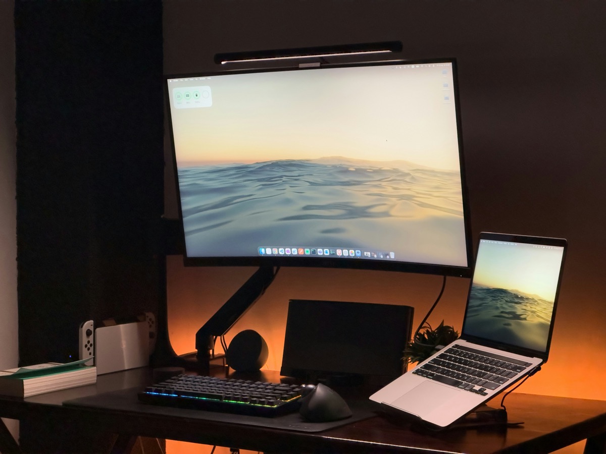 Clean workspace setup with monitors and desk accessories